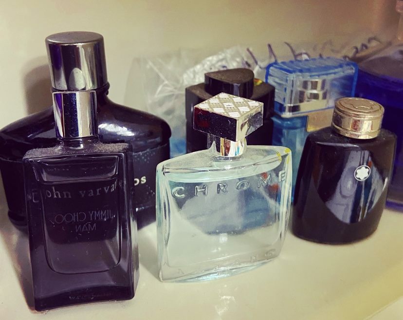 A collection of bottles of cologne 